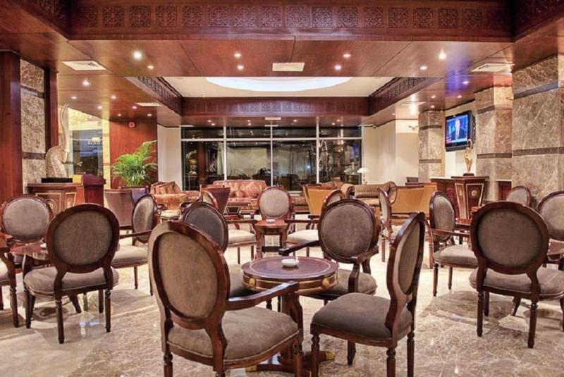 Gloria Hotel Doha Restaurante foto